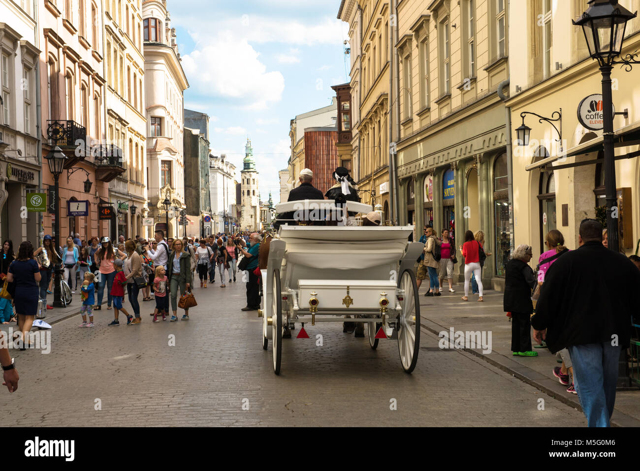Krakow, Poland - August, 2017: city street with lots of people on the background. Stock Photo