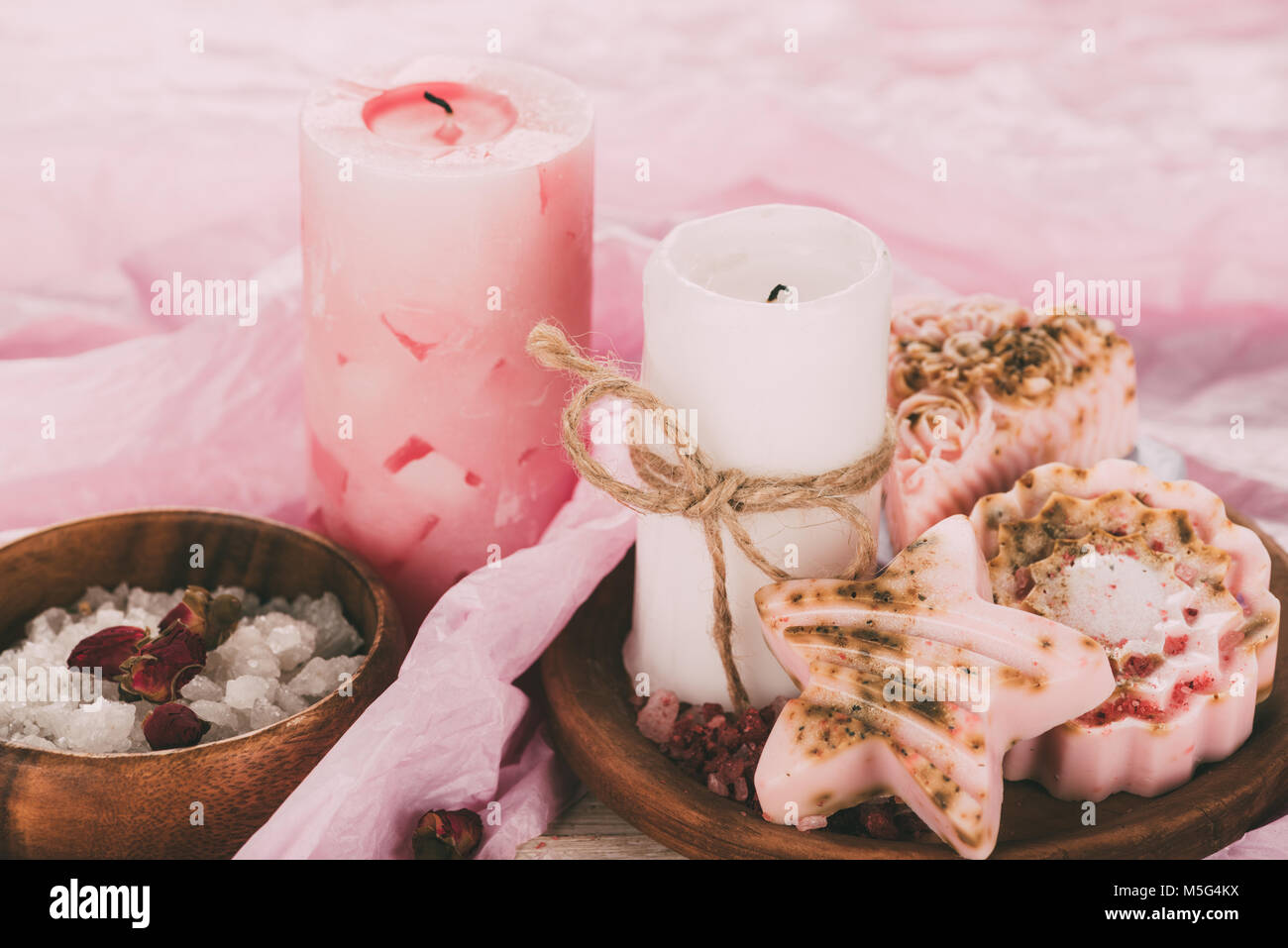 Two candles, bathroom salt and soap Stock Photo Alamy