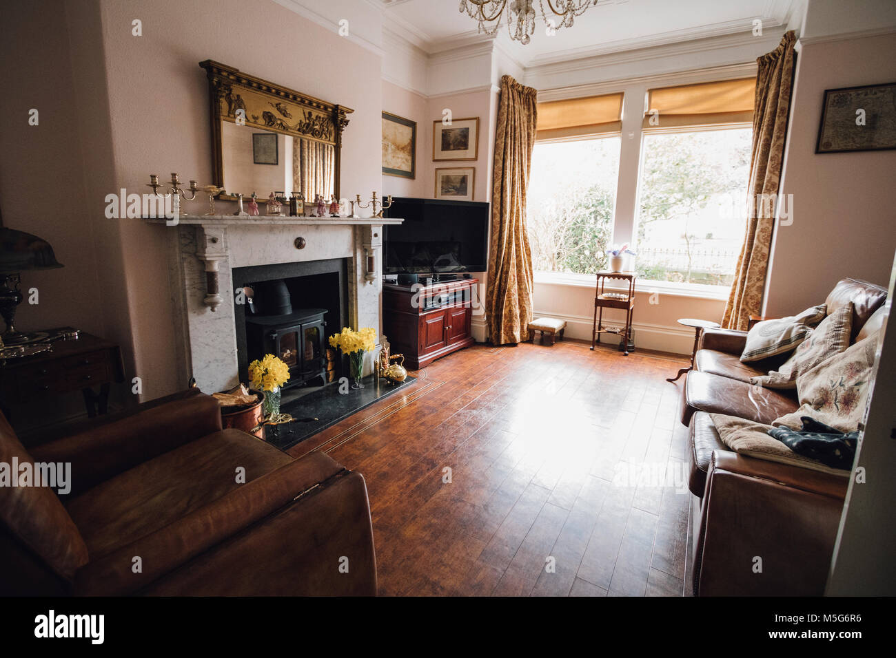 Empty room shot of a traditionally British, elderly couple's living room. Stock Photo