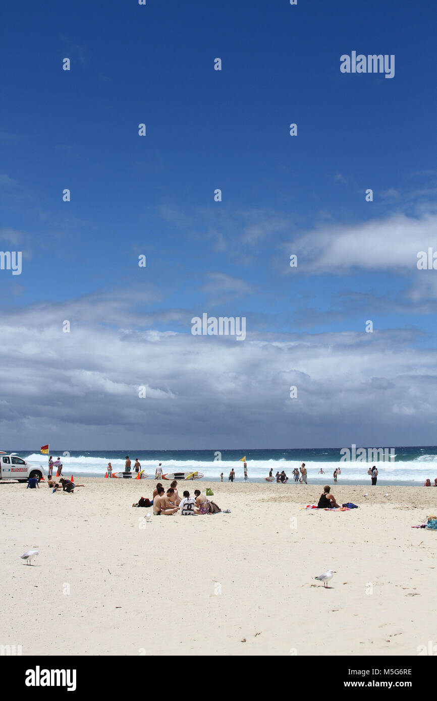 Gold Coast beach with tourists, Queensland, Australia Stock Photo