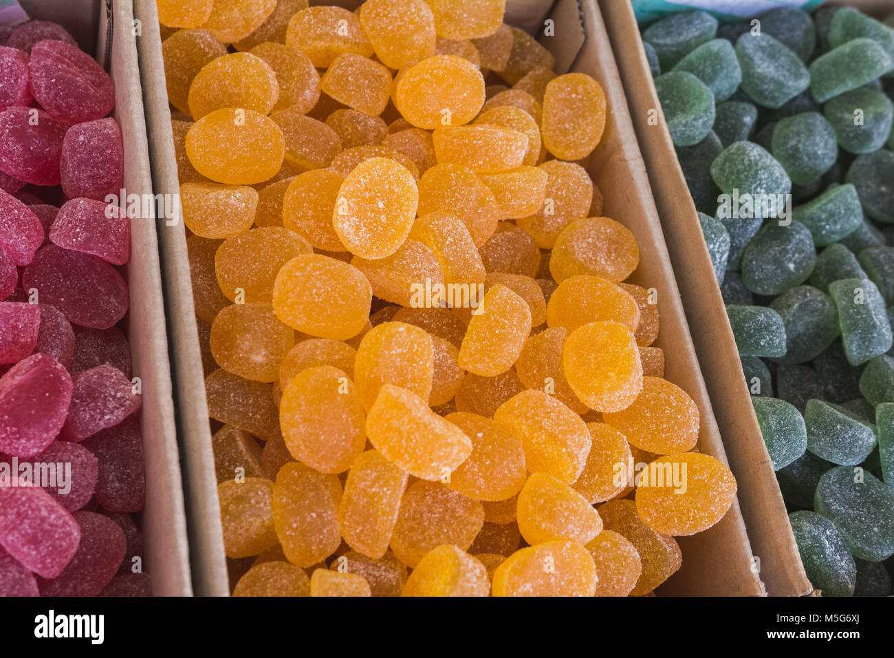 Yellow marmalade with the icing sugar at street market Stock Photo Alamy