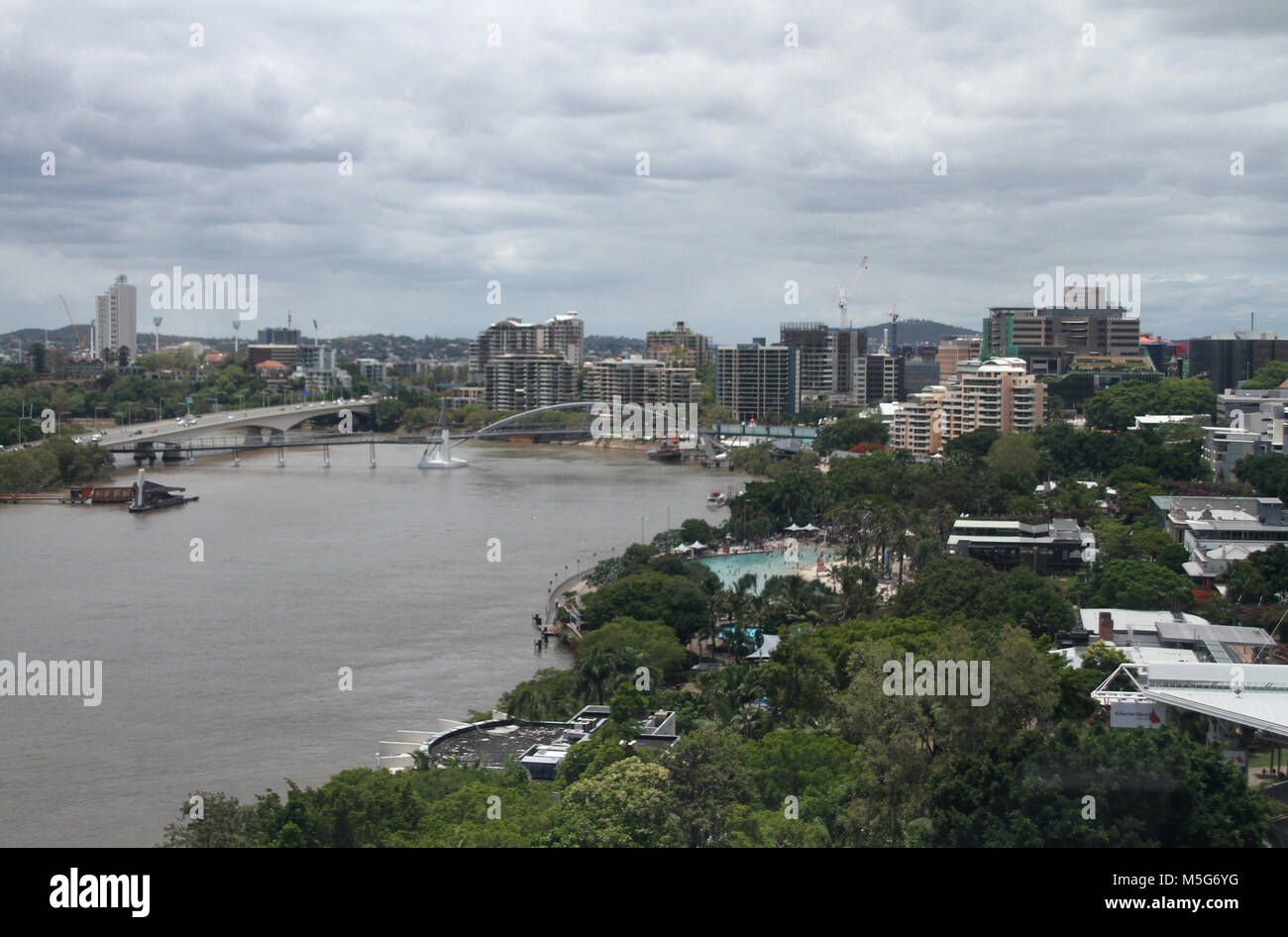 View from the Wheel of Brisbane showing cityscape, Brisbane River and Streets Beach , Brisbane, Australia Stock Photo