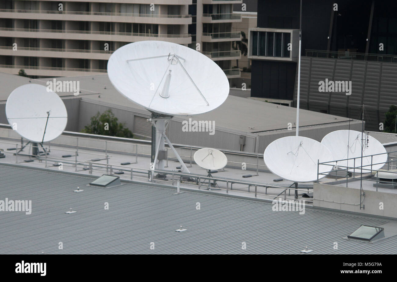 Satellite dishes on the roof of a building, Brisbane, Australia Stock Photo