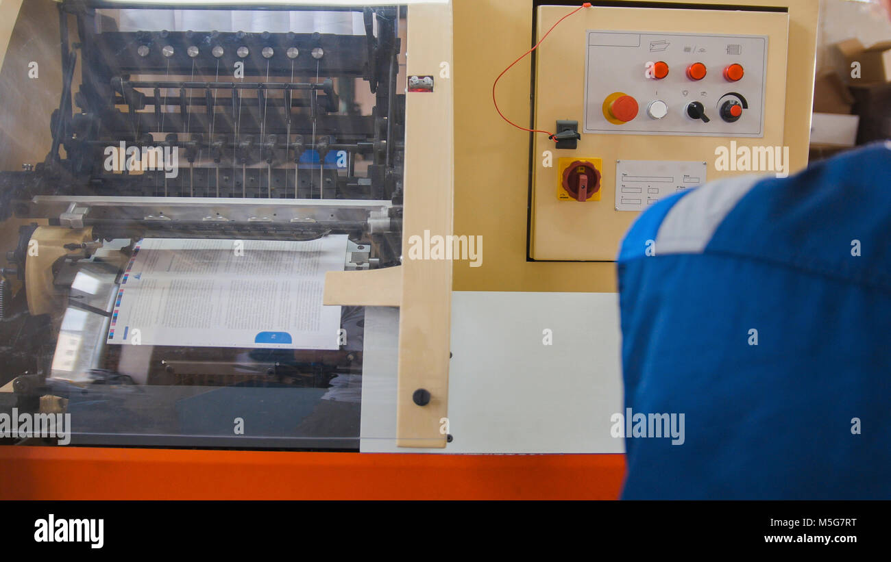A printing machine controlled by a print operator Stock Photo Alamy