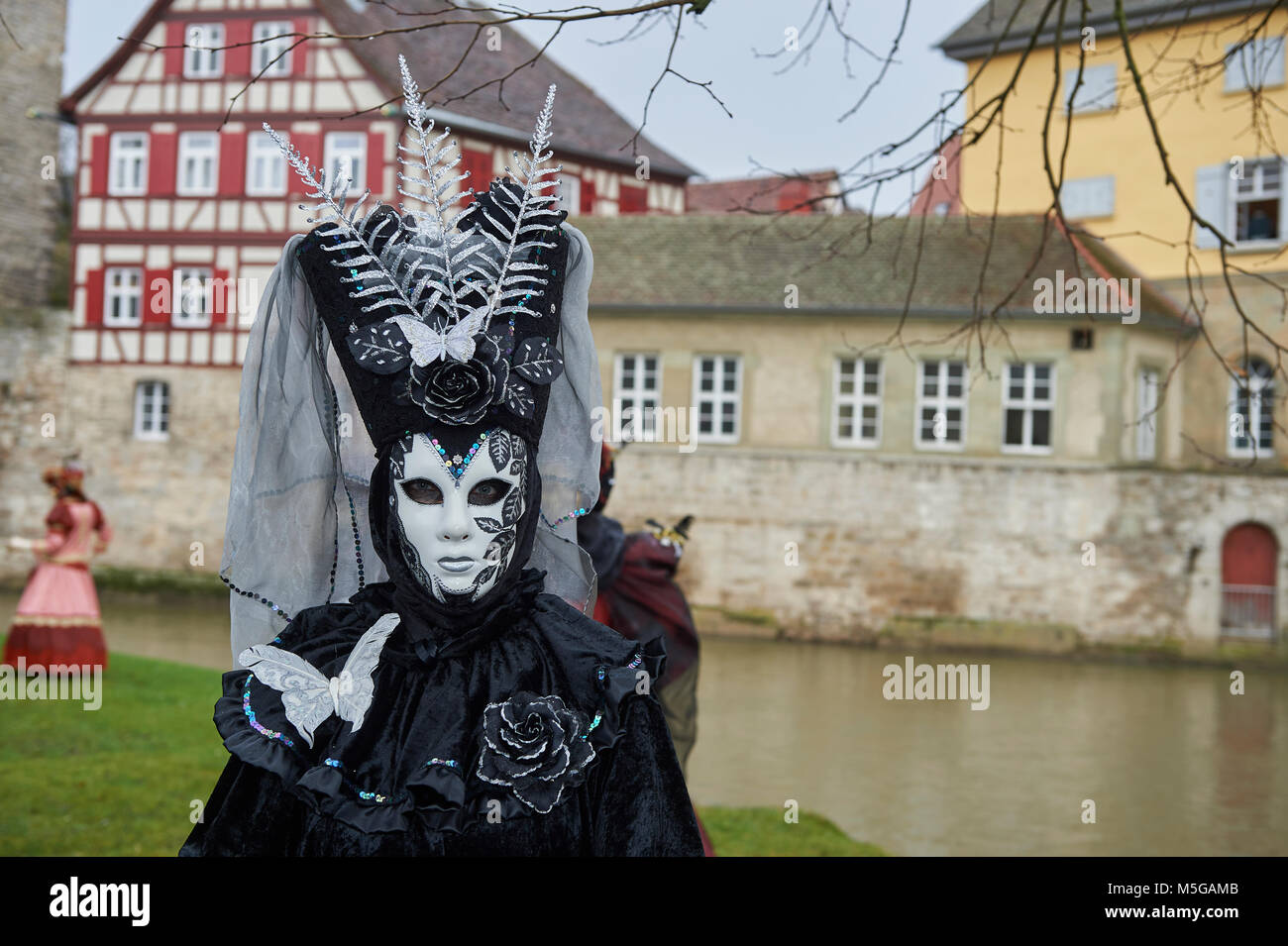 Venetian Carnival in Schwäbisch Hall a small and medieval city in Germany. the festival is called Hallia Venezia. Stock Photo