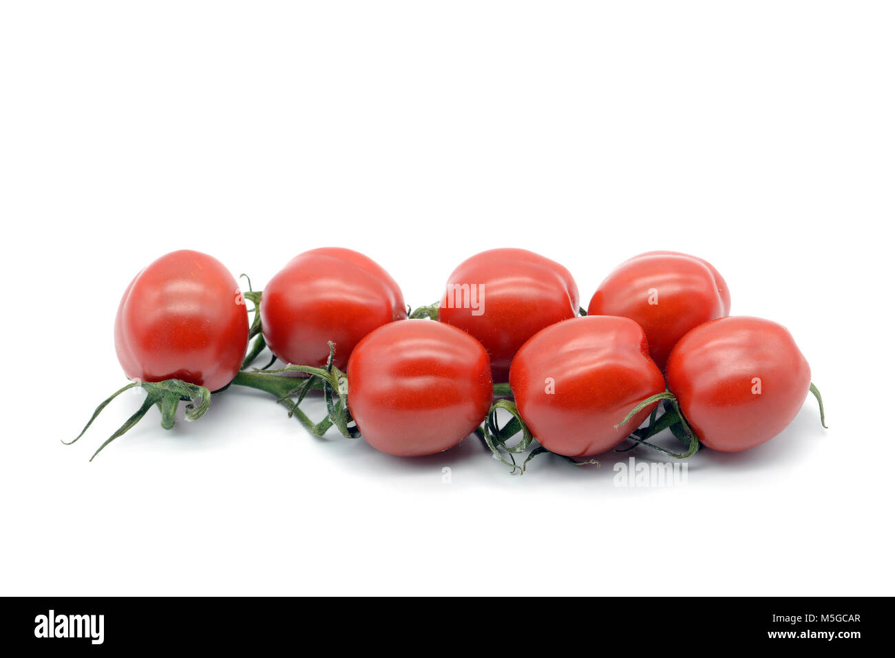 fresh red tomatos on white isolated background Stock Photo - Alamy