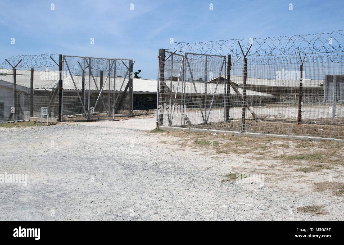 Barbed wire fence on Robben Island, former prison, Cape Town, South Africa Stock Photo