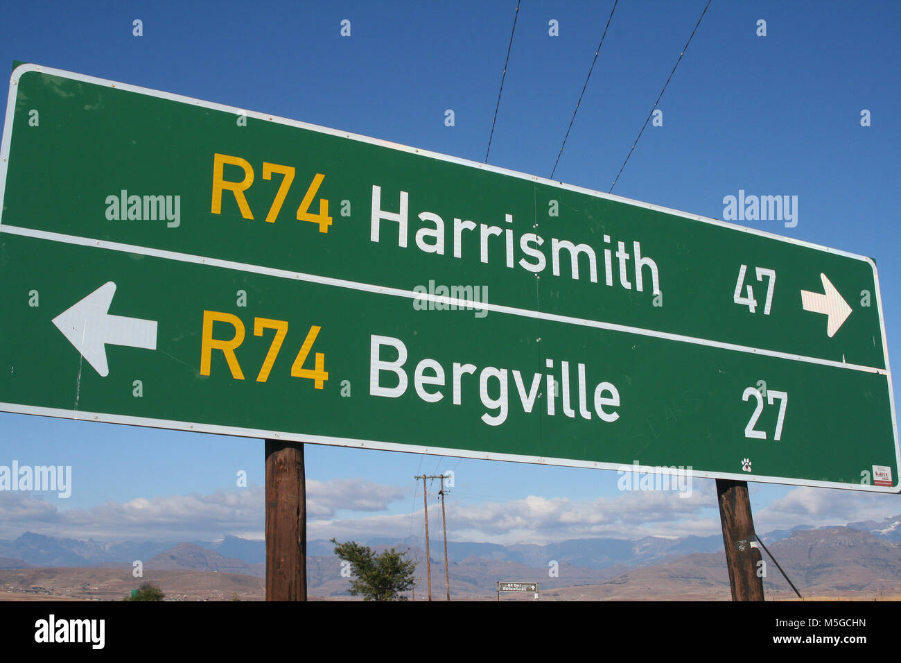 Road sign showing R74 to Harrismith and R74 to Bergville, Drakensburg, South Africa Stock Photo