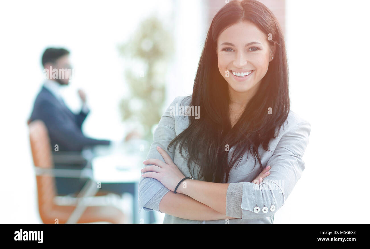 successful young business woman on the office background Stock Photo ...