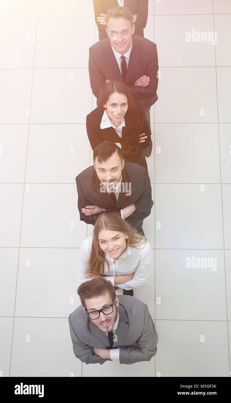 business team standing in a column on a white background Stock Photo ...