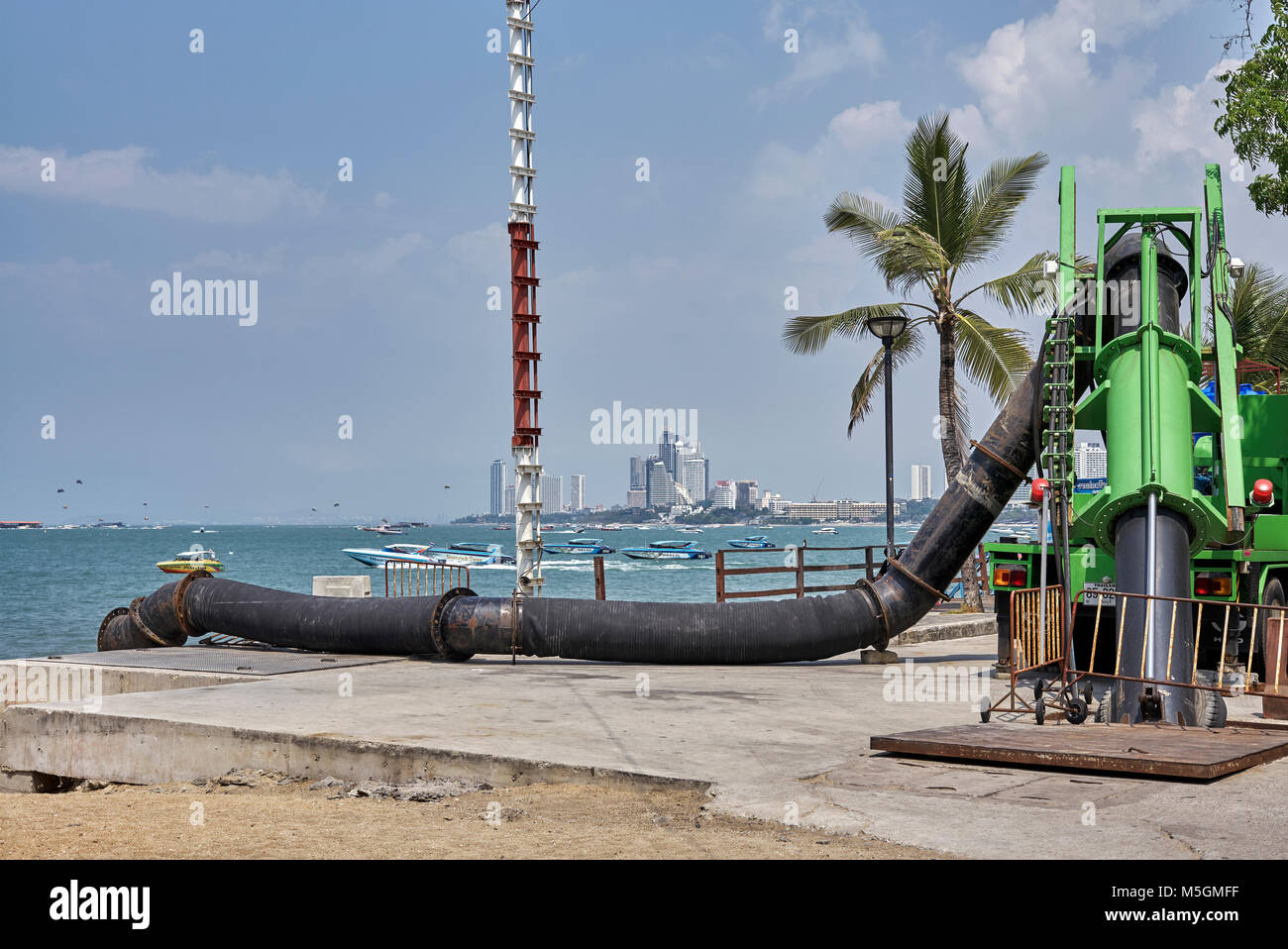 Flood control. Drainage rig utilised to remove excess rainwater from flooded street and disperse into the sea. Pattaya. Thailand Stock Photo