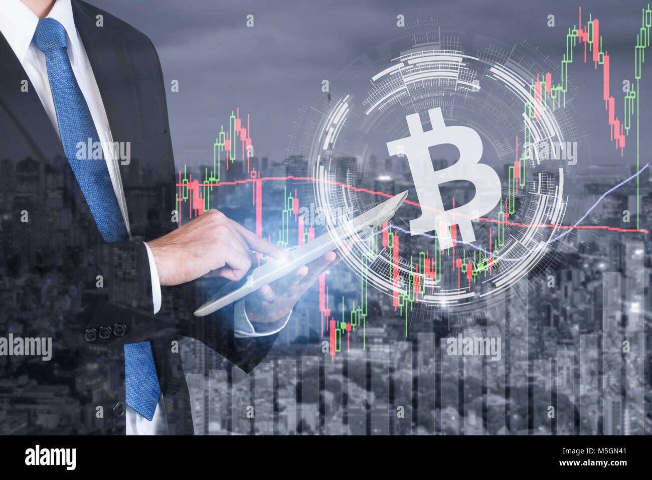 Businessman using the tablet deal bitcoin trading exchange stock market investment, forex with trend of graph, price and candle stick chart of stock c Stock Photo