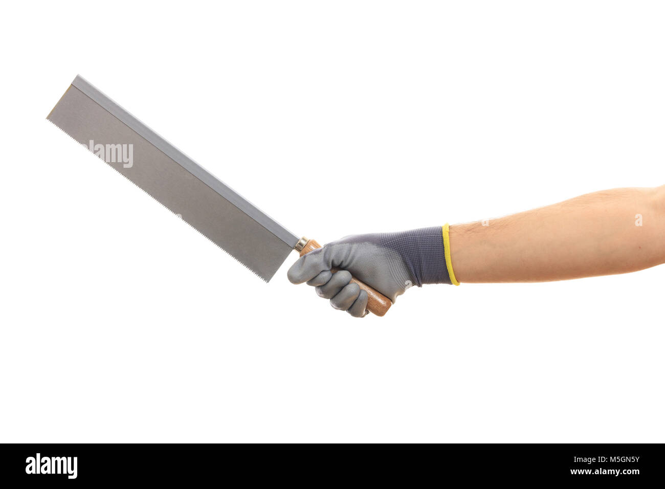 Hand holding a saw with wooden grip on white background Stock Photo