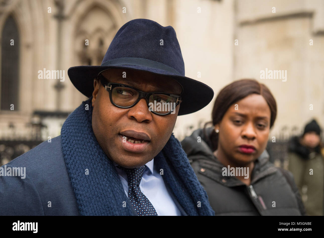 Isaiah Haastrup's father Lanre Haastrup and mother Takesha Thomas speak to the media outside the Royal Courts of Justice, London, after losing the latest round of a life-support battle over their disabled son Isaiah. Stock Photo