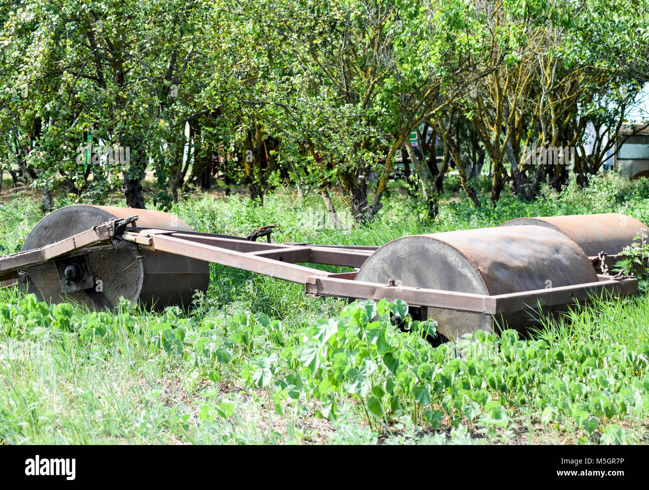 Soil rink. Presser and soil tamper on trailer for tractor Stock Photo