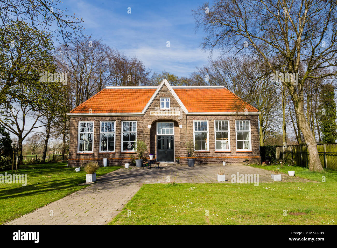 Old primary school building in Twekkelo in the province Overijssel, the garden of the Netherlands Stock Photo