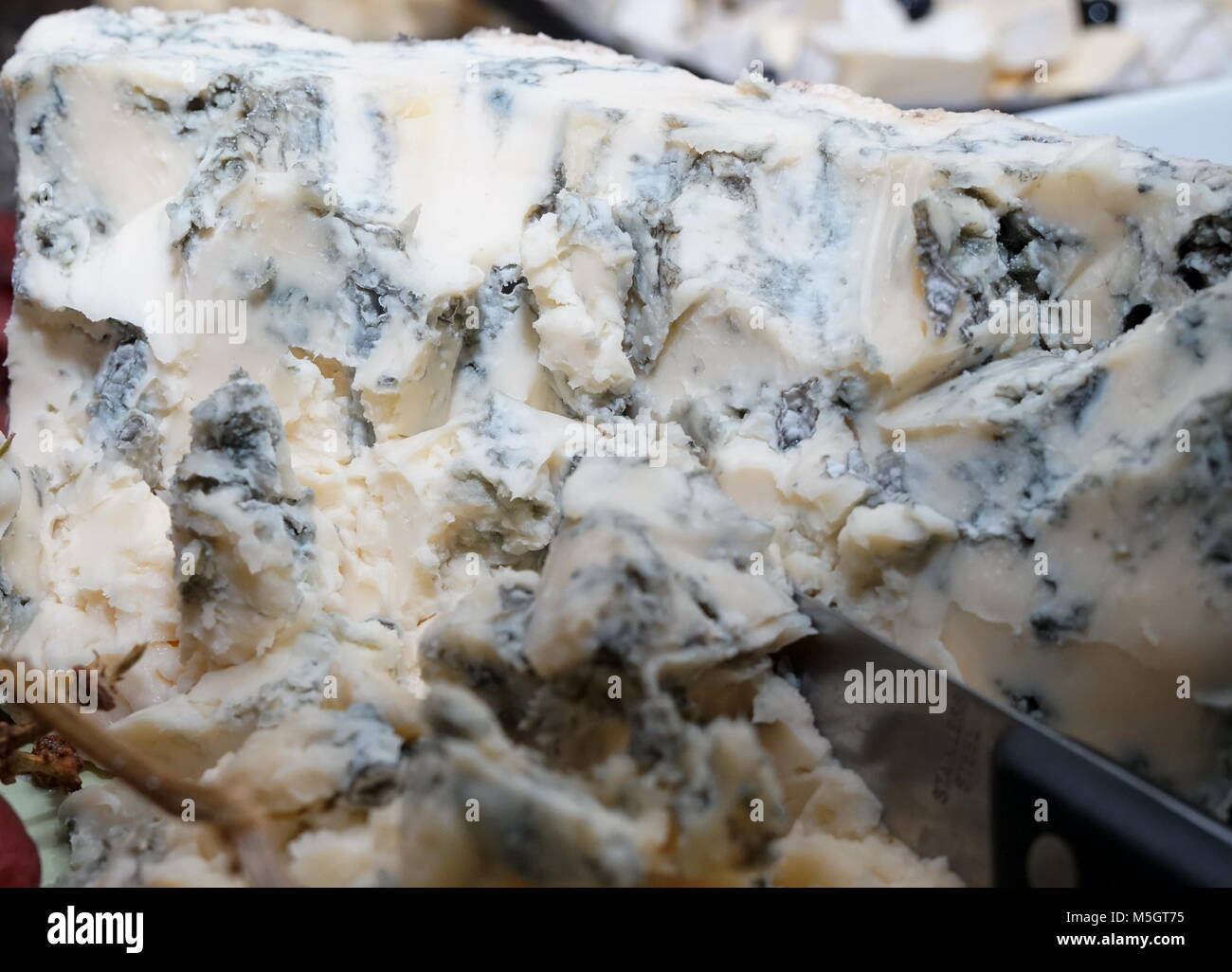 Wedge of blue cheese Stock Photo Alamy