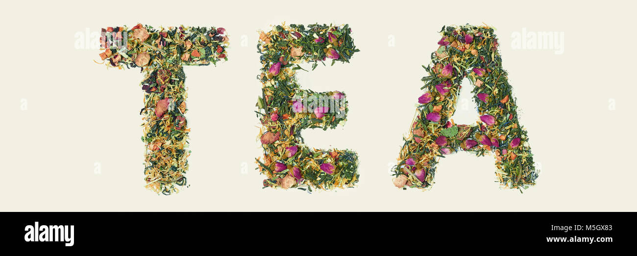 Tea leaf with flowers and fruit word tea on white background, top view ...