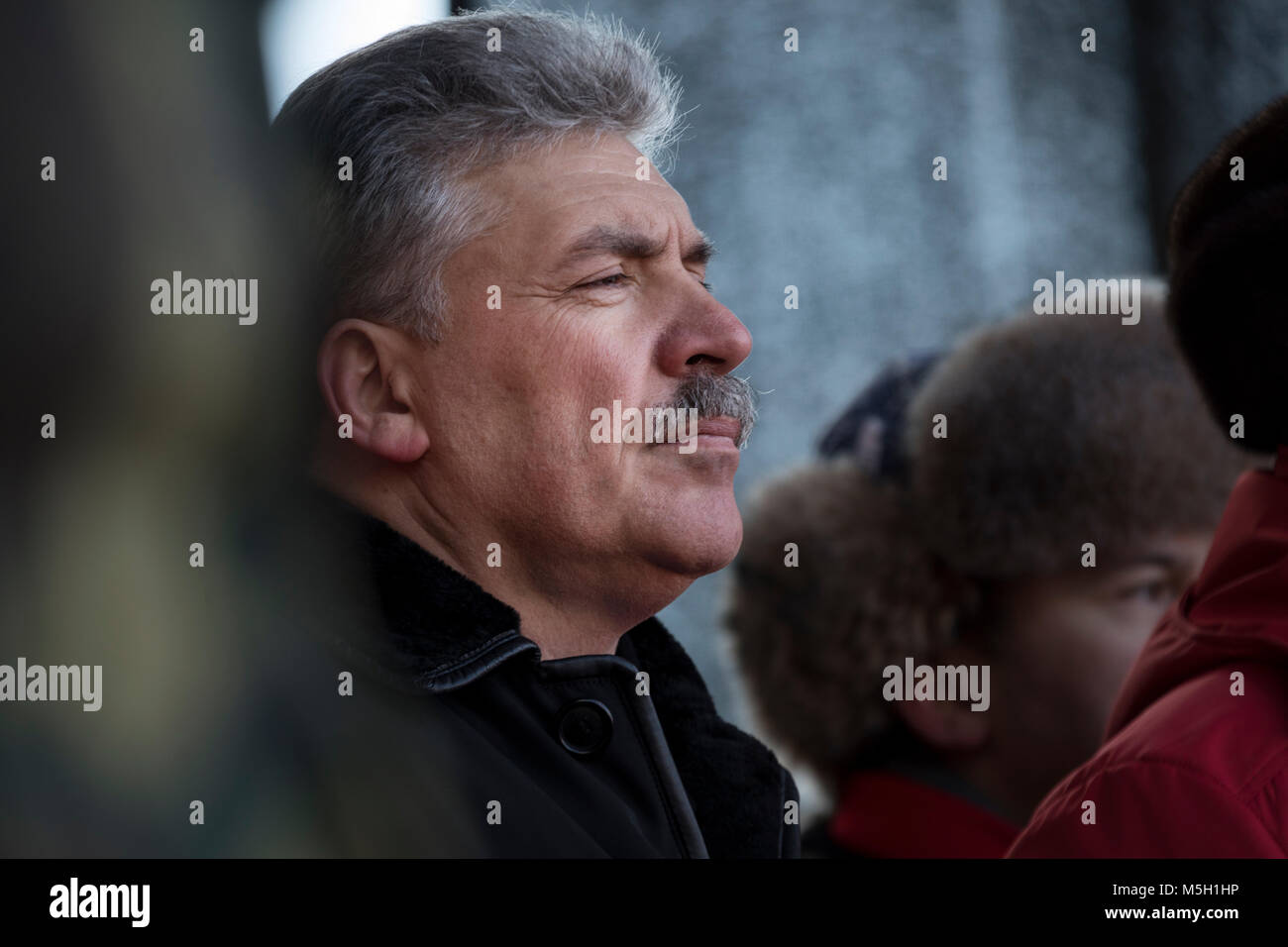 Moscow, Russia. 23rd Feb, 2018. Pavel Grudinin, the presidential candidate for the Communist Party of the Russian Federation (CPRF), attends a rally organised by the CPRF in central Moscow to celebrate the 100th birthday of the Workers' and Peasants' Red Army, which was the ground and air forces of the Russian Soviet Federative Socialist Republic and later the armed forces of the Soviet Union (USSR) Credit: Nikolay Vinokurov/Alamy Live News Stock Photo