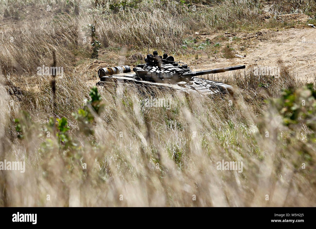 Naguanagua, Carabobo, Venezuela. 23rd Feb, 2018. February 23, 2018. Tanks of war models BMP3 and T72 conducted draw for cross-country obstacles, as part of the military exercises ''Soberania 2018'' ordered by President Nicolas Maduro. The war activity took place at the headquarters of the 41 Armored Brigade, located in Naguanagua, Carabobo state. Photo: Juan Carlos Hernandez Credit: Juan Carlos Hernandez/ZUMA Wire/Alamy Live News Stock Photo