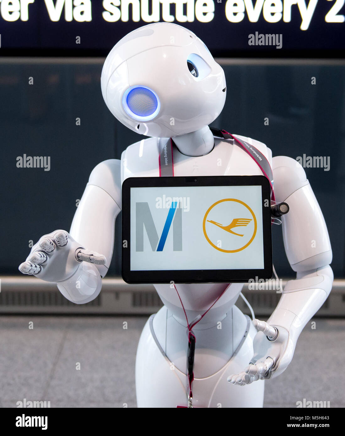 Munich, Germany. 20th Feb, 2018. Robot Josie Pepper assists passengers  travelling from the airport in Munich, Germany, 20 February 2018. Pepper is  a humanoid robot programmed to analyse and emulate human gestures