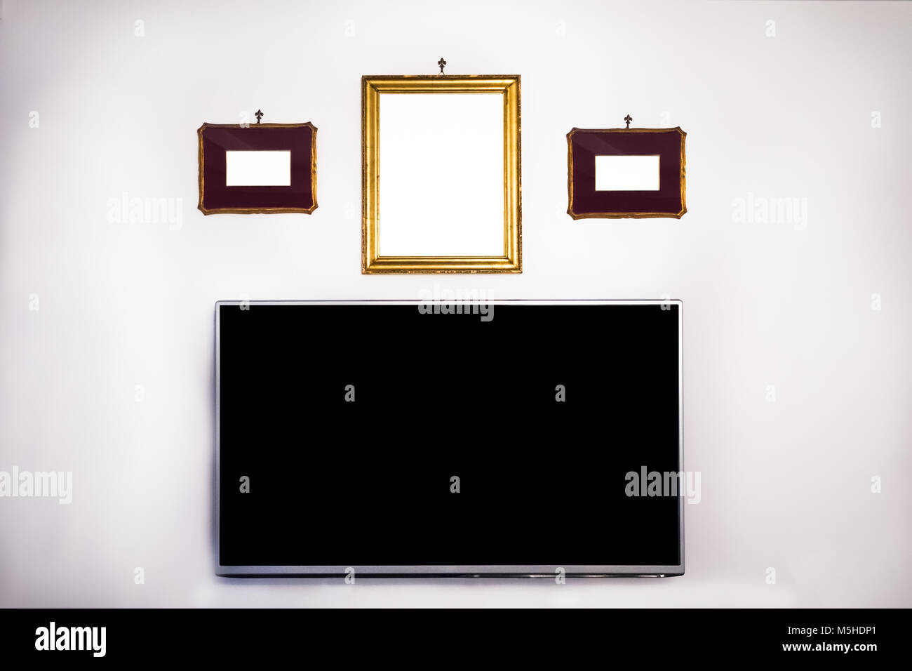 Empty classical frames and television mock up Stock Photo