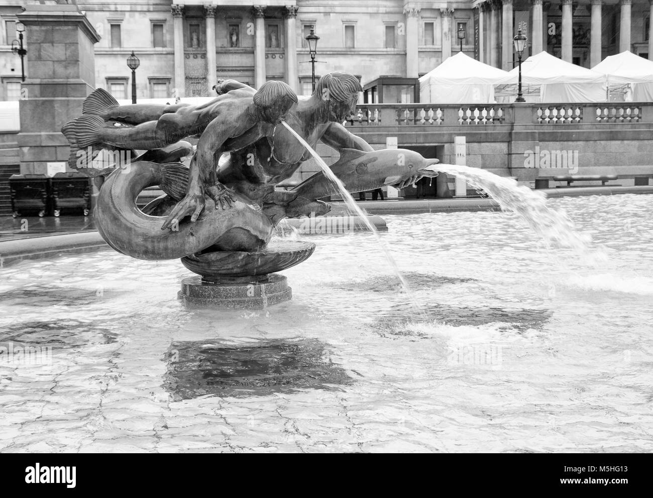 Fountain in Trafalgar Square, Central London, England, UK. Credit: London Snapper Stock Photo