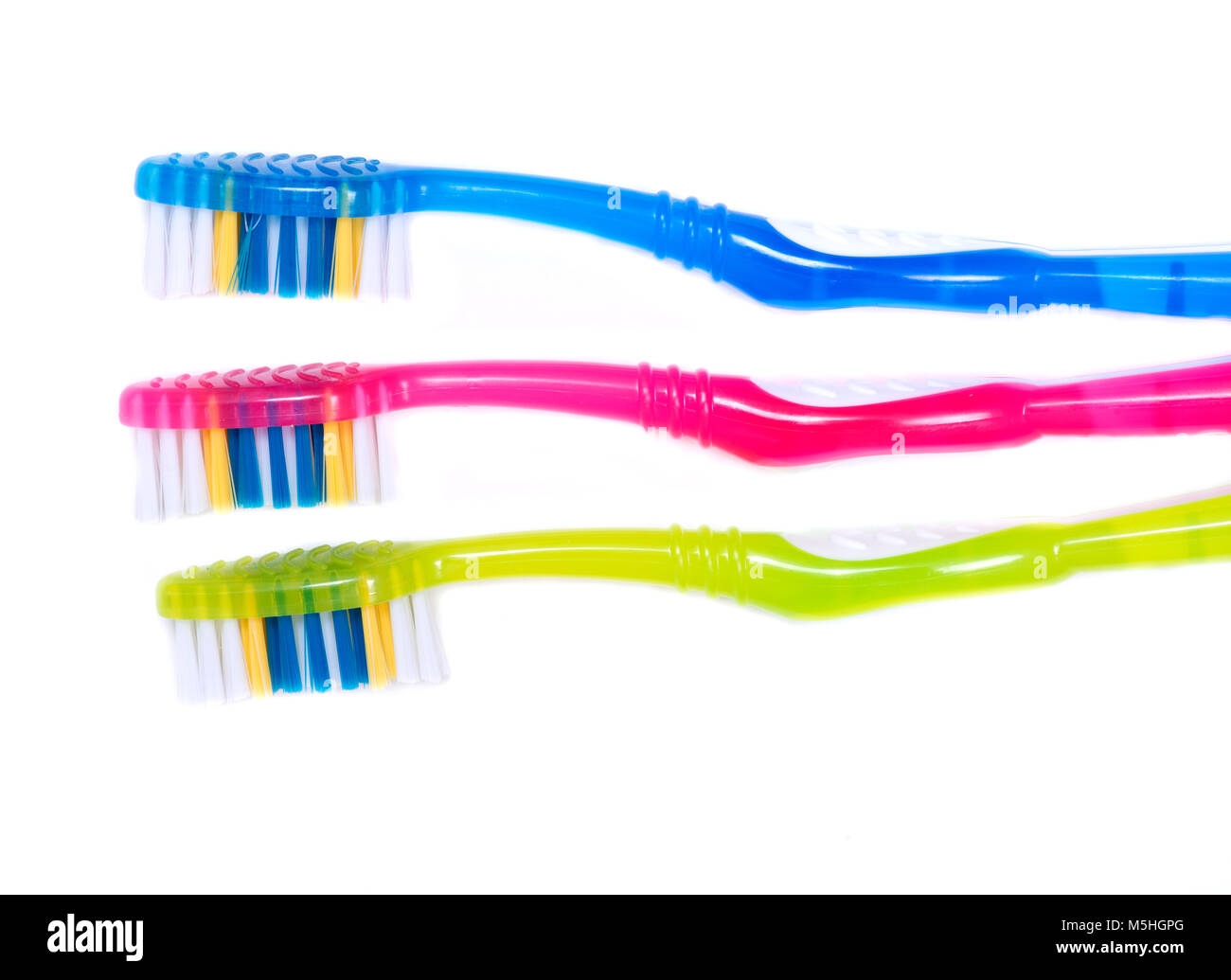 Colorful plastic toothbrush isolated on white background Stock Photo ...