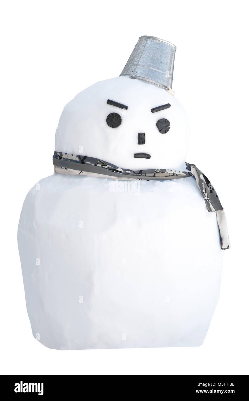 A snowman with an angry expression Stock Photo