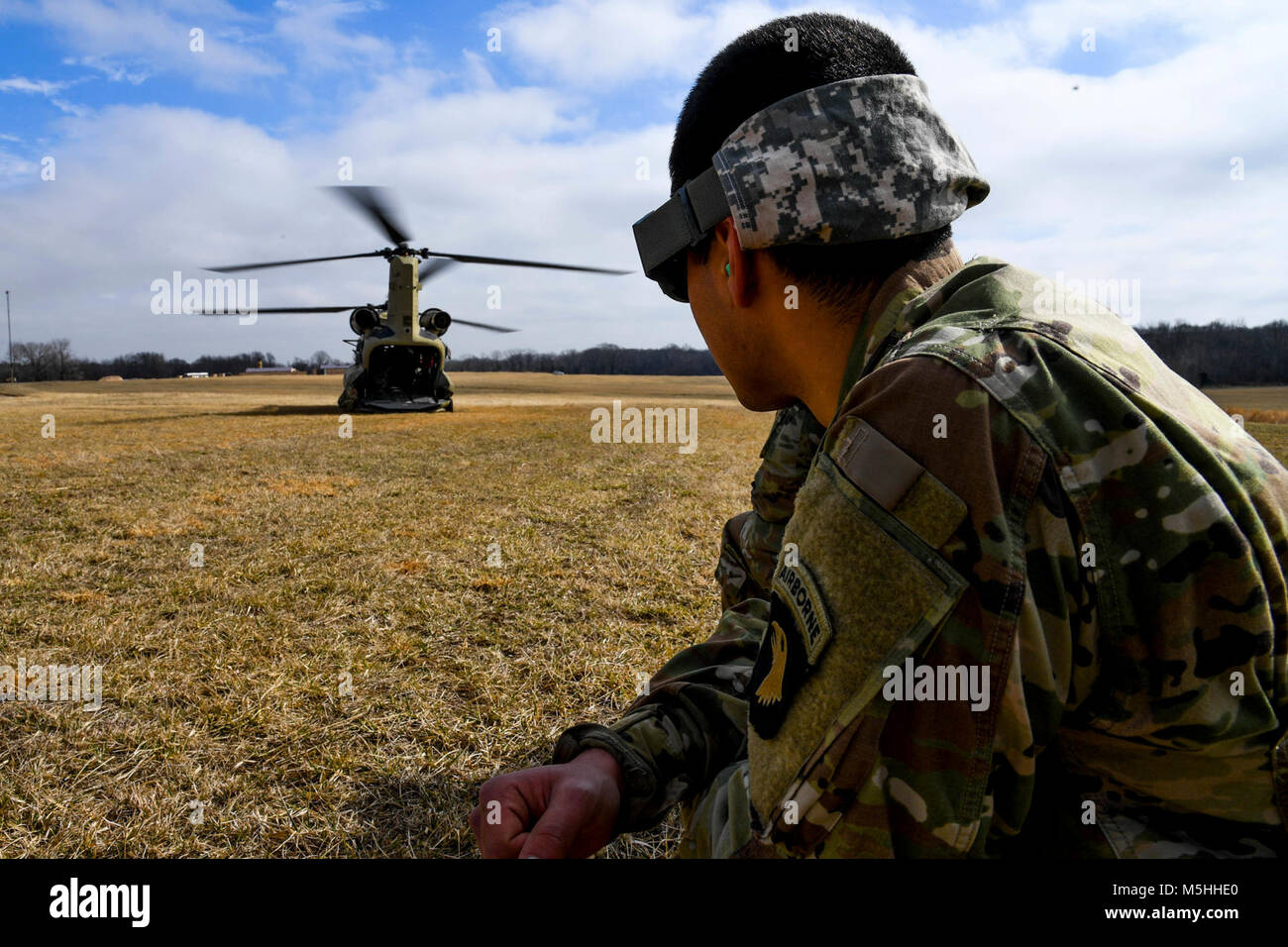 Soldiers with the 101st Combat Aviation Brigade, 101st Airborne Division (Air Assault) load equipment into a CH-47 Chinook helicopter in preparation to jump their tactical operations center (TOC) to a new location during Warfighter, a two-week command and control exercise February 13, 2017 at Ft. Campbell, Ky. (U.S. Army Stock Photo