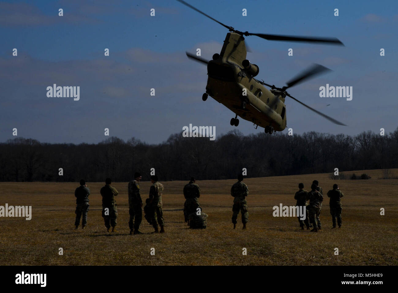 Soldiers with the 101st Combat Aviation Brigade, 101st Airborne Division (Air Assault) load equipment into a CH-47 Chinook helicopter in preparation to jump their tactical operations center (TOC) to a new location during Warfighter, a two-week command and control exercise February 13, 2017 at Ft. Campbell, Ky. (U.S. Army Stock Photo