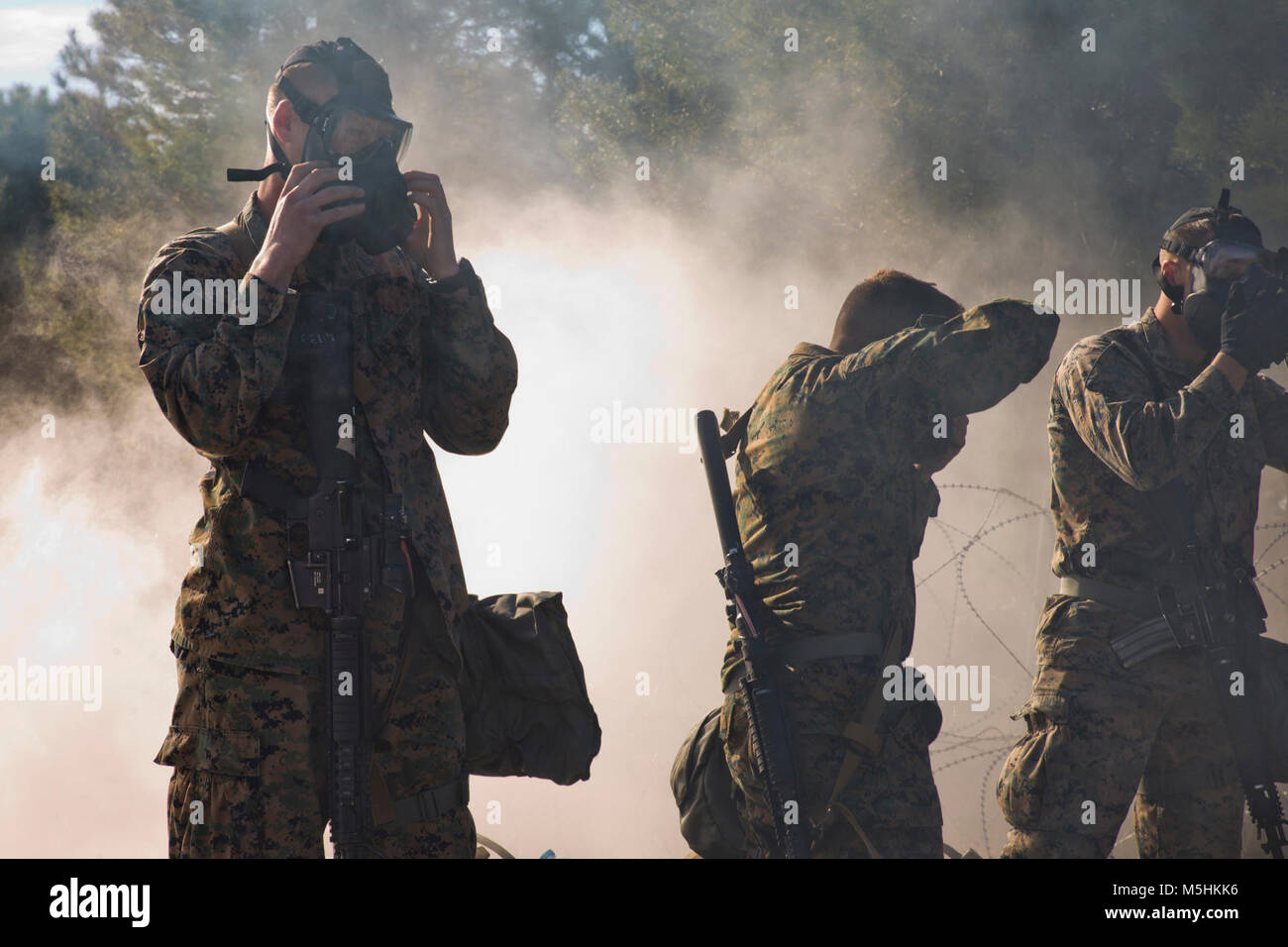 U.S. Marines with Special-Purpose Marine Air-Ground Task Force-Crisis Response-Africa, logistics combat element, simulate a gas attack during a field exercise at Morón Air Base, Spain, Feb. 7, 2018. SPMAGTF-CR-AF is deployed to conduct limited crisis-response and theater-security operations in Europe and North Africa. (U.S. Marine Corps Stock Photo