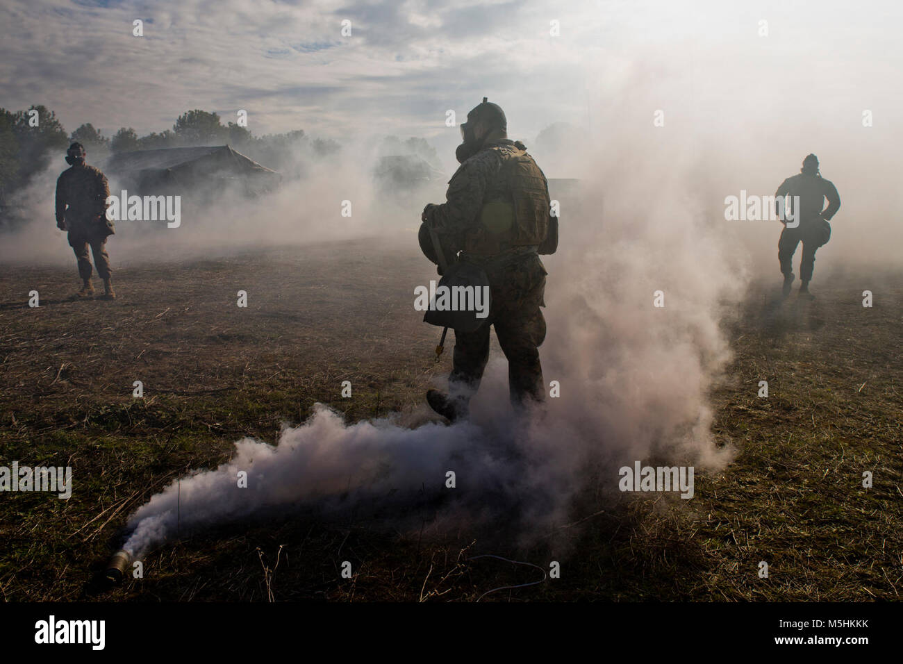 U.S. Marines with Special-Purpose Marine Air-Ground Task Force-Crisis Response-Africa, logistics combat element simulate, a gas attack during a field exercise at Morón Air Base, Spain, Feb. 7, 2018. SPMAGTF-CR-AF is deployed to conduct limited crisis-response and theater-security operations in Europe and North Africa. (U.S. Marine Corps Stock Photo