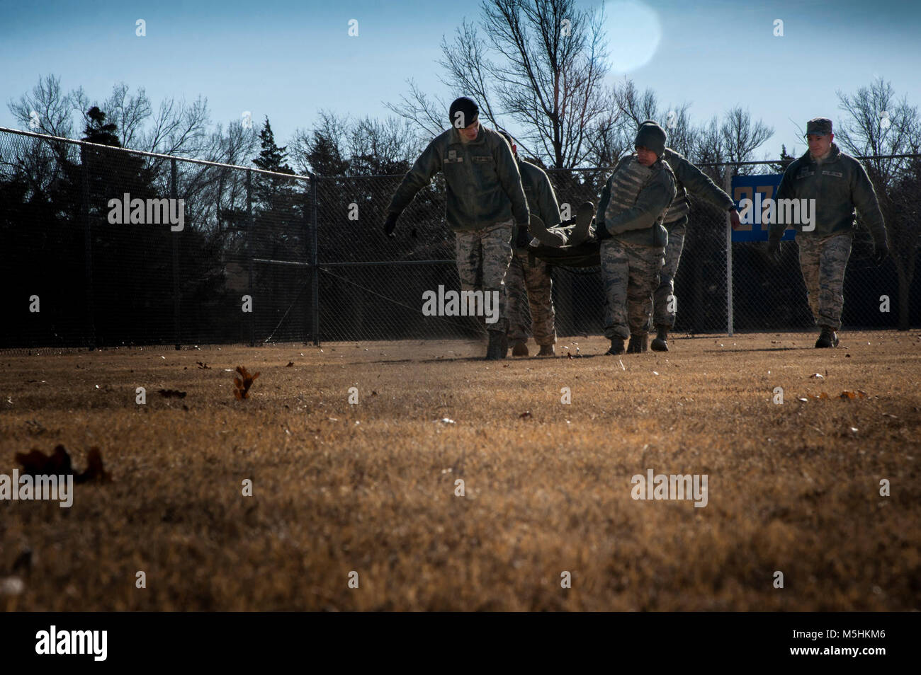 Vance Airmen carry a simulated injured Airman during an exercise Feb. 8, 2018 at Vance Air Force Base. During the exercise, Airmen were trained in Self-Aid Buddy Care so that they may perform first aid in the event of an emergency. (U.S. Air Force Stock Photo