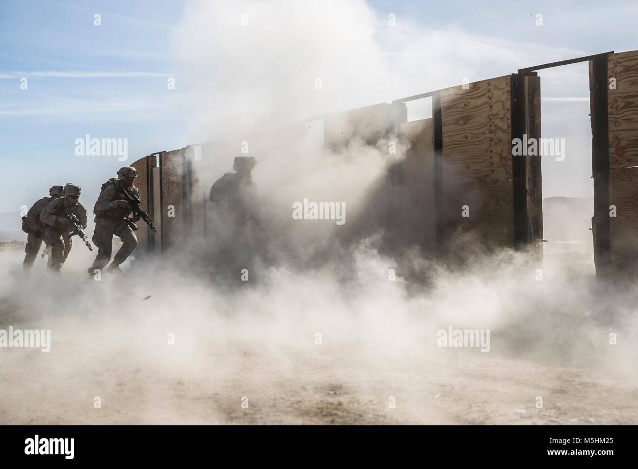 Marines with 3rd Battalion, 7th Marine Regiment, participate in door breaching training at Range 220 aboard the Marine Corps Air Ground Combat Center Twentynine Palms, Calif., Feb. 9, 2018 as part of Integrated Training Exercise 2-18. The purpose of ITX is to create a challenging, realistic training environment that produces combat-ready forces capable of operating as an integrated MAGTF. (U.S. Marine Corps Stock Photo