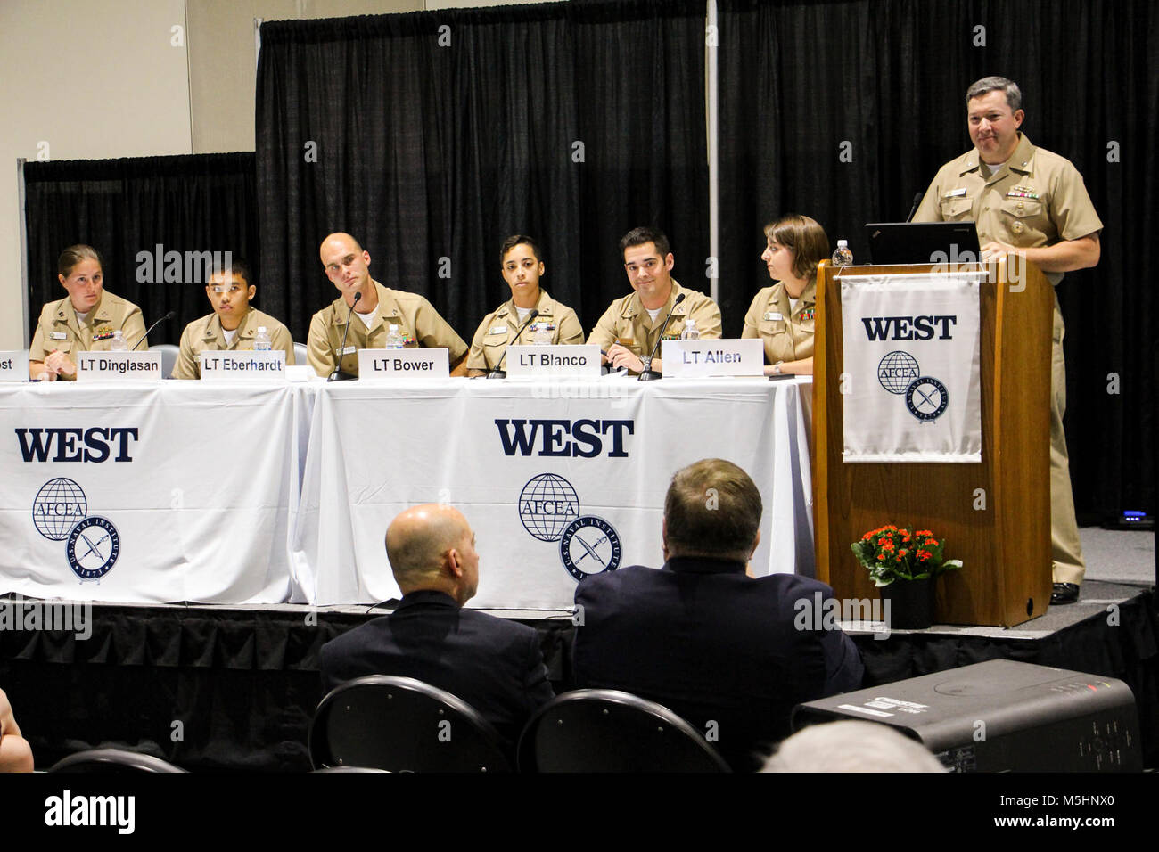 Cmdr. Jeff Heames, right, assistant chief of staff for operations and training at Naval Surface and Mine Warfighting Development Center (SMWDC), responds to a question during a Warfare Tactics Instructor (WTI) panel discussion during WEST 2018, a three-day conference co-sponsored by Armed Forces Communications and Electronics Association (AFCEA) and U.S. Naval Institute (USNI). SMWDC is one of the Navy's five Warfighting Development Centers and its mission is to increase the lethality and tactical proficiency of the Surface Force across all domains. (U.S. Navy Stock Photo