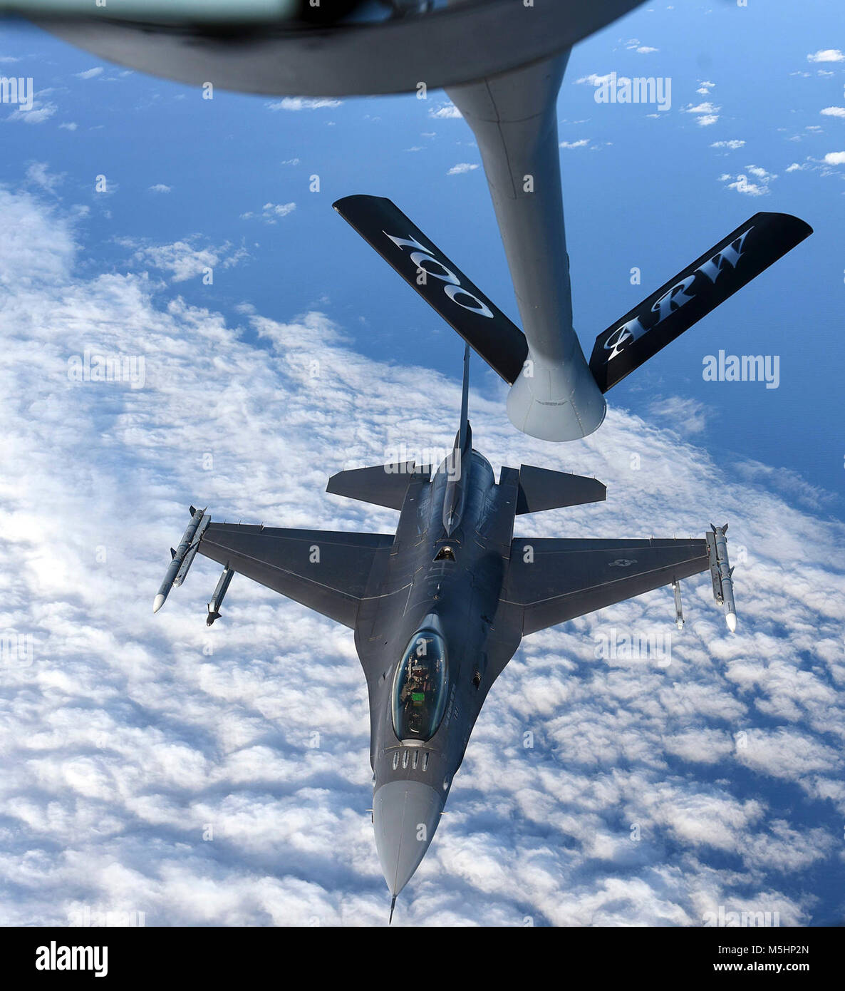 U.S. Air Force F-16C Fighting Falcon flies behind a U.S. Air Force KC-135 Stratotanker before conducting an aerial refueling during training in Swedish airspace, Feb. 8, 2018. The training was in conjunction with a rotational deployment of U.S. Air Force F-16C Fighting Falcons from the Ohio Air National Guard’s 180th Fighter Wing to Amari Air Base, Estonia, as part of a Theater Security Package. (U.S. Air Force Stock Photo