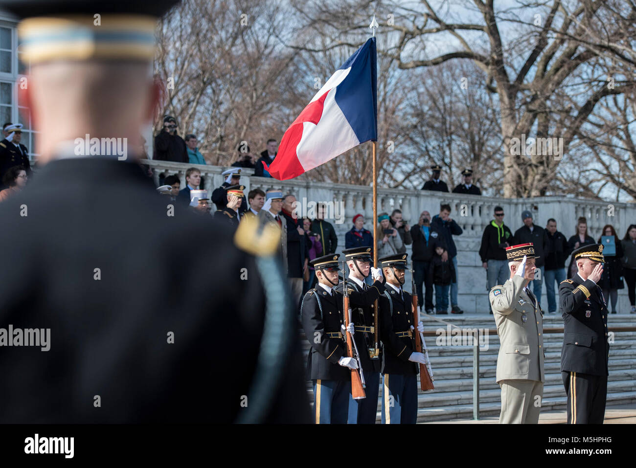 Gen. François Lecointre (second to right), chief of the defence staff, French Armed Forces; and Maj. Gen. John P. Sullivan (far right), assistant deputy chief of staff, G-4; render honors during an Armed Forces Full Honors Wreath-Laying Ceremony at the Tomb of the Unknown Soldier at Arlington National Cemetery, Arlington, Virginia, Feb. 12, 2018. Lecointre visited ANC as part of his first official visit, touring the Memorial Amphitheater Display Room and meeting with ANC Senior Leadership. (U.S. Army Stock Photo