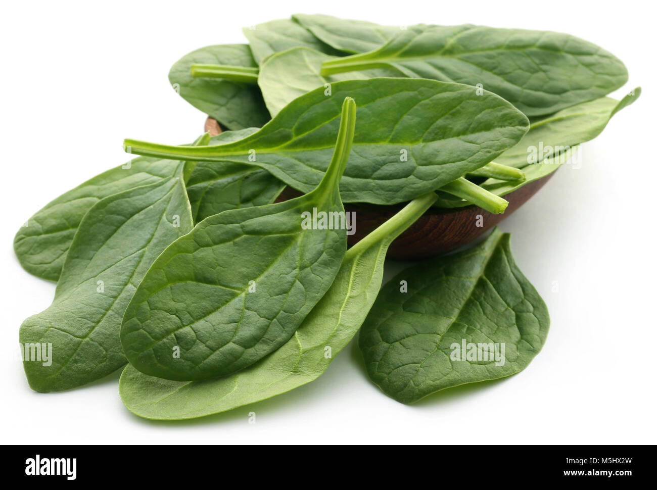Fresh Spinach over white background Stock Photo - Alamy