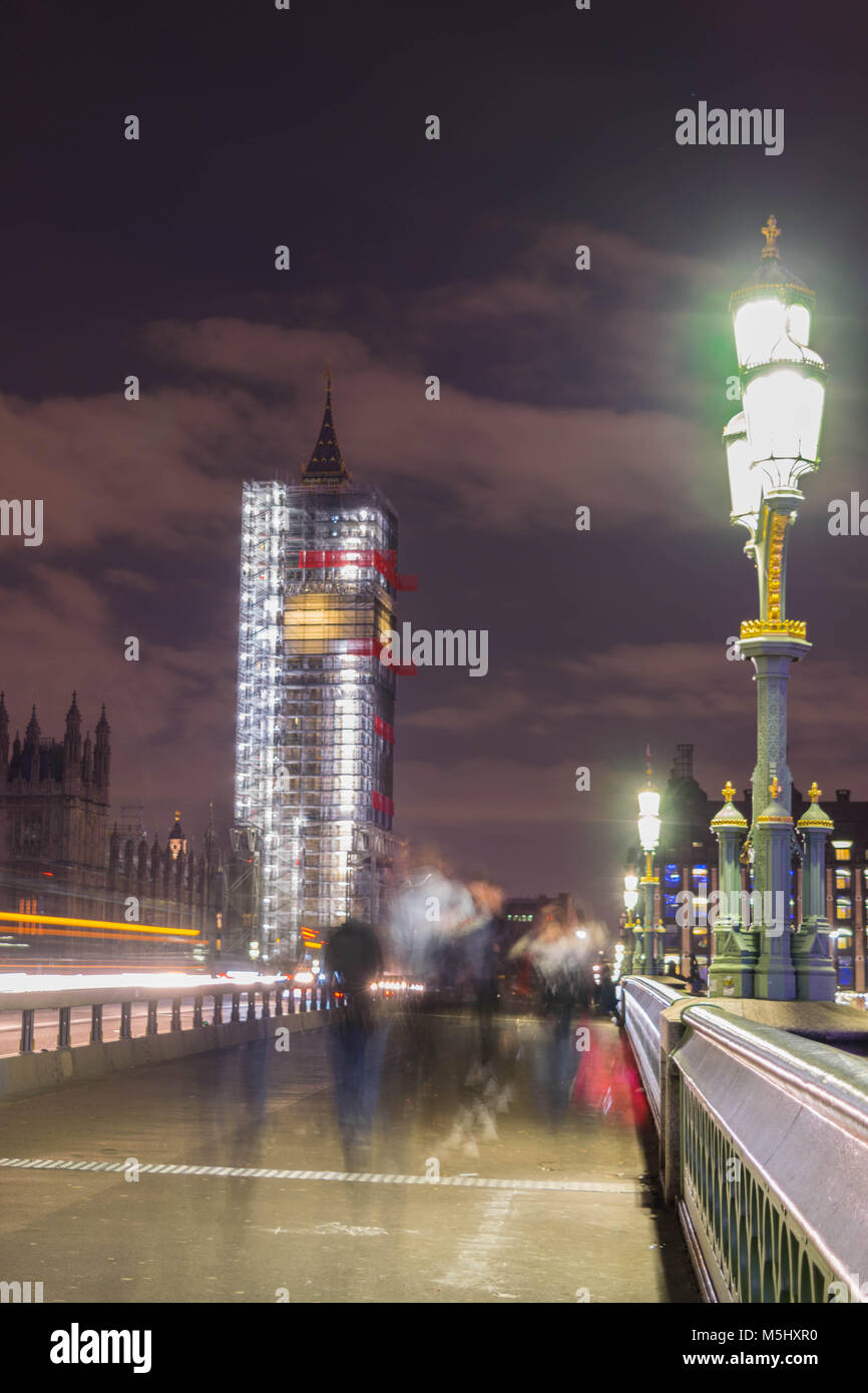 London, United Kingdom, February 17, 2018: long exposure shot of Westminster bridge and big ben renovation scaffolding construction with the house of parliament in view Stock Photo