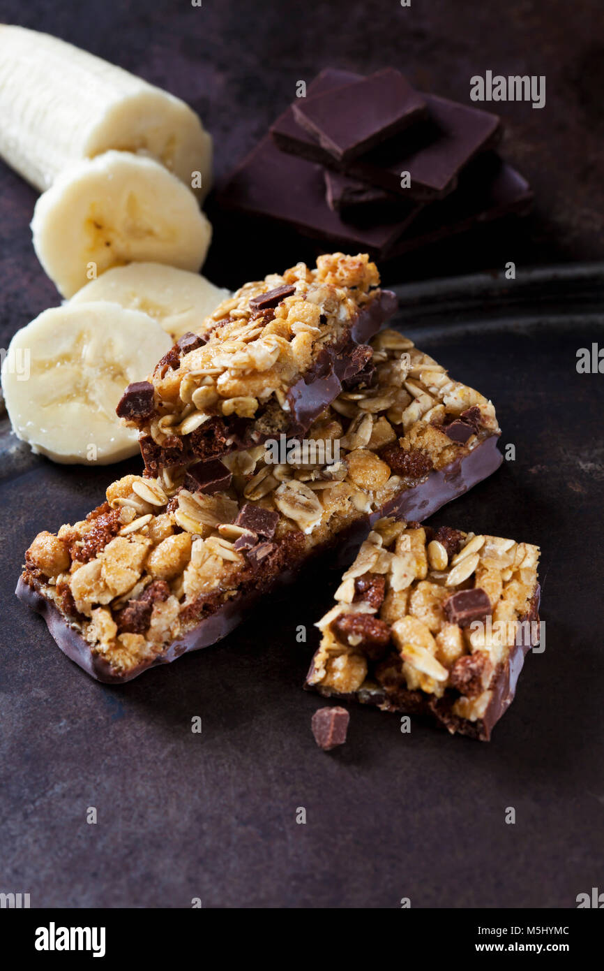 Muesli bars with oat flakes, banana and chocolate Stock Photo Alamy