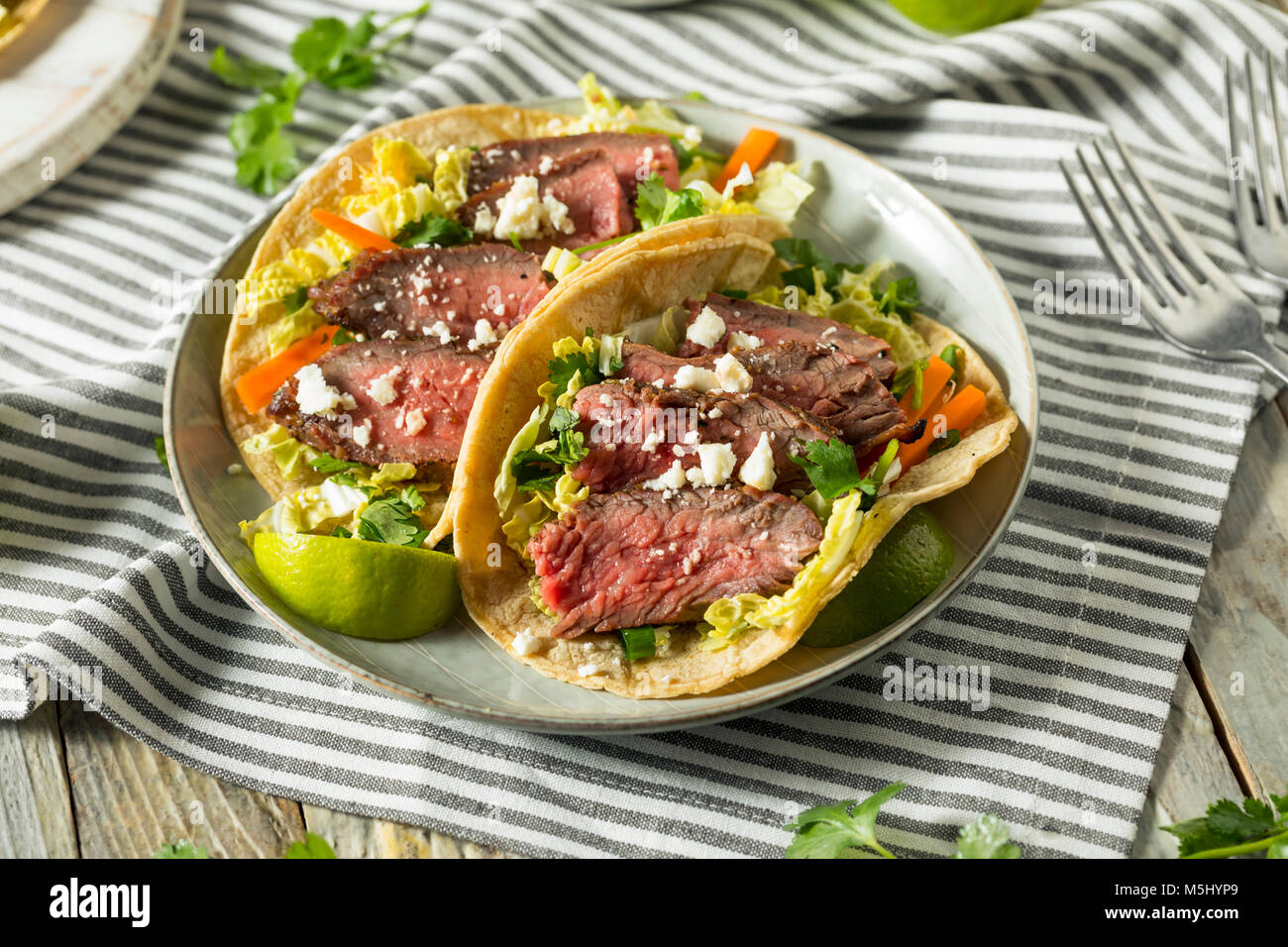 Homemade Korean Steak Tacos with Cabbage Cilantro and Cheese Stock