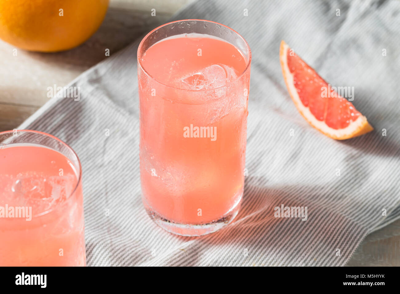 Healthy Fresh Grapefruit Flavored Sparkling Water with Ice Stock Photo