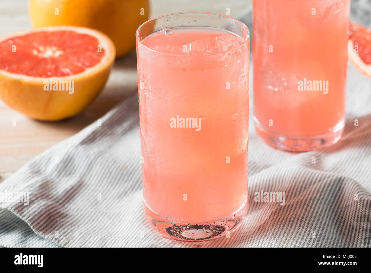 Healthy Fresh Grapefruit Flavored Sparkling Water with Ice Stock Photo