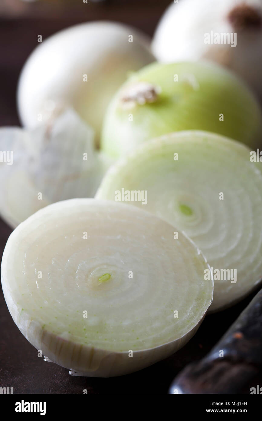 Sliced and whole white onions Stock Photo - Alamy