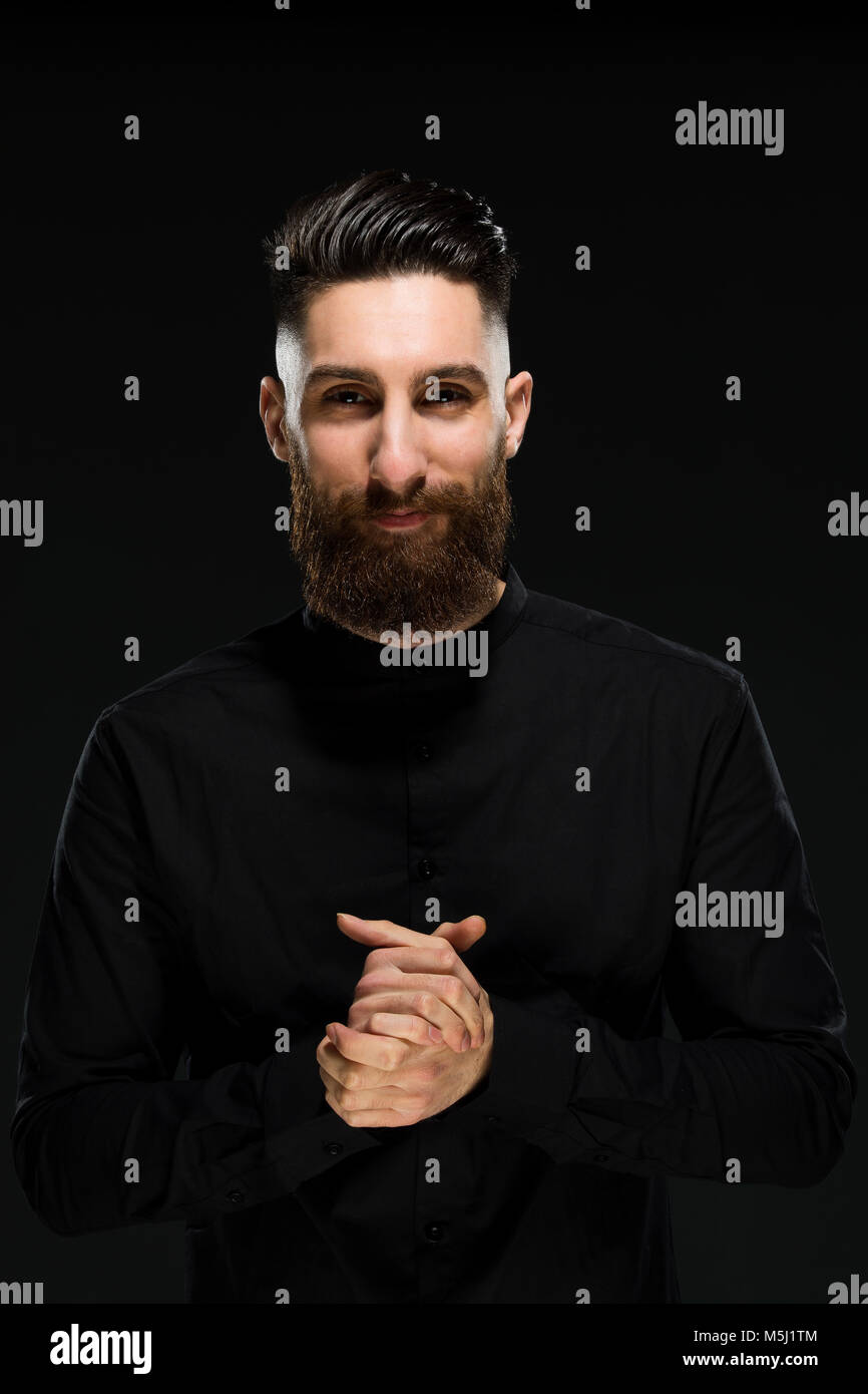 Portrait of a young man, looking pleased Stock Photo