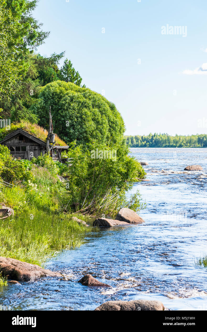 Finland, lapland, Torne river, border river, hut, View from Finland to Sweden Stock Photo