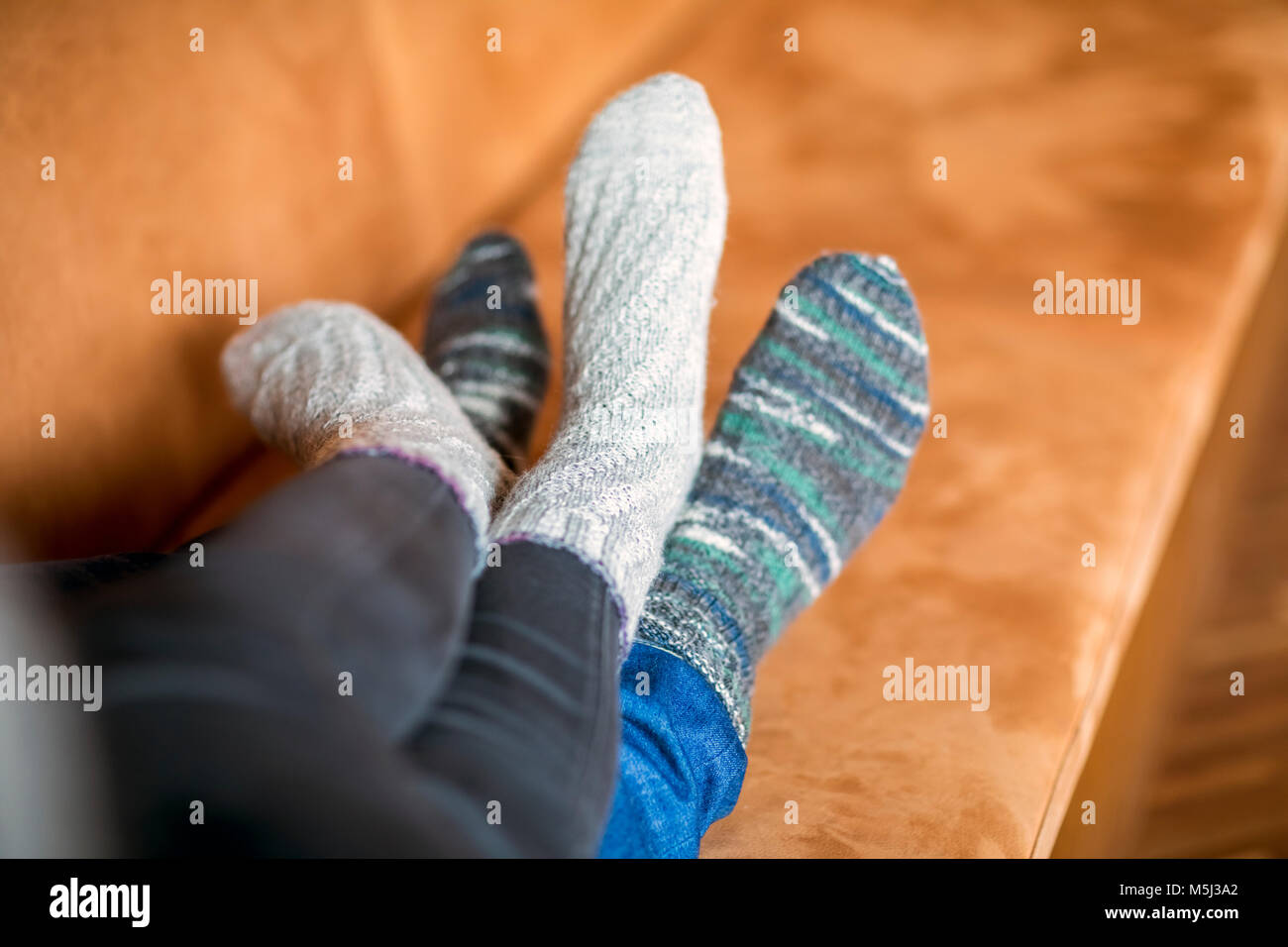Feet on couch hires stock photography and images Alamy