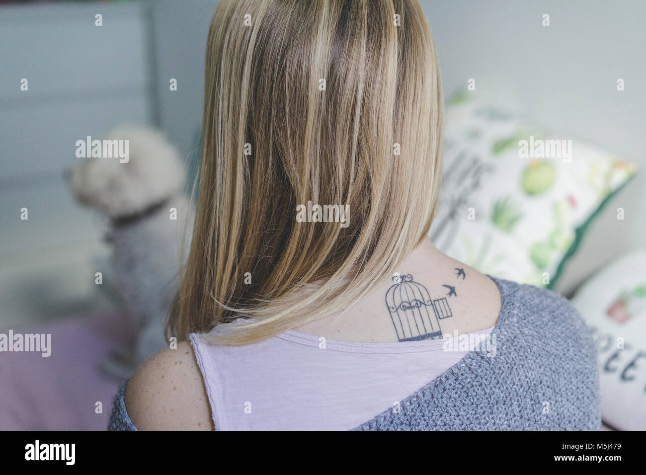 Tattoo back of neck women hi-res stock photography and images - Alamy