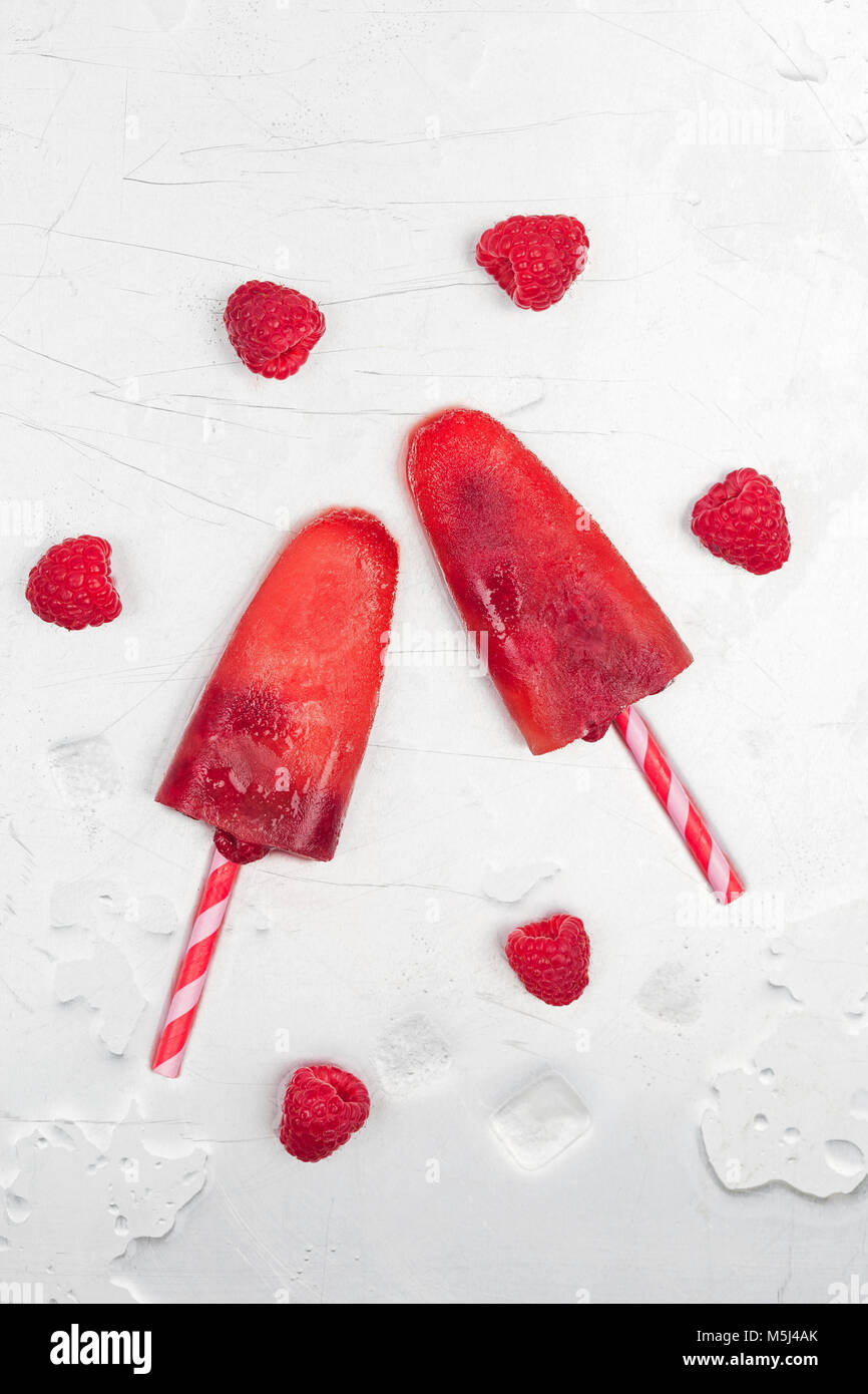Fruit ice lollies with fresh raspberries Stock Photo Alamy